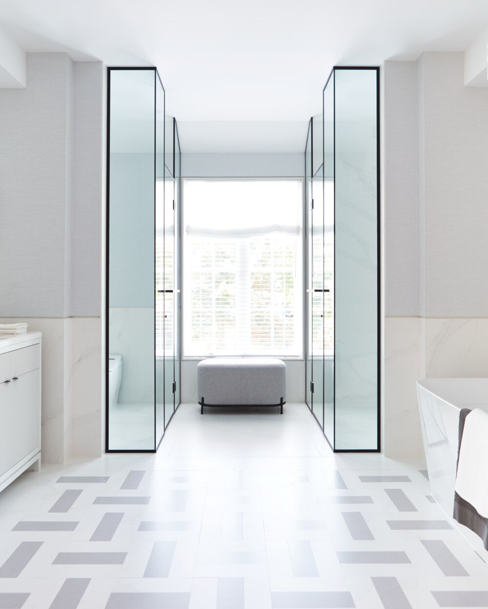 How to add character to a black and white bathroom