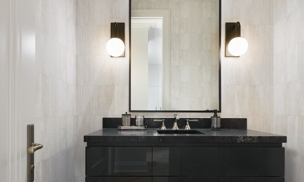 GlucksteinElements Limestone Tile wallpaper Orly sconce lights powder room